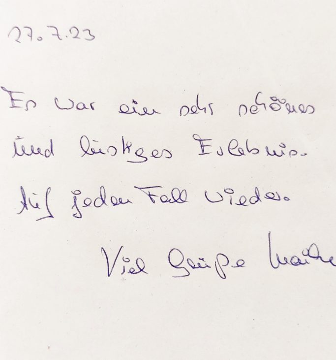 Handgeschriebene Notiz vom 27.07.23 über ein bevorstehendes Treffen.